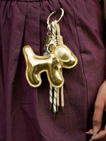 Load image into Gallery viewer, Gold Chic Dog Bag Charm – Cute & Stylish Accessory
